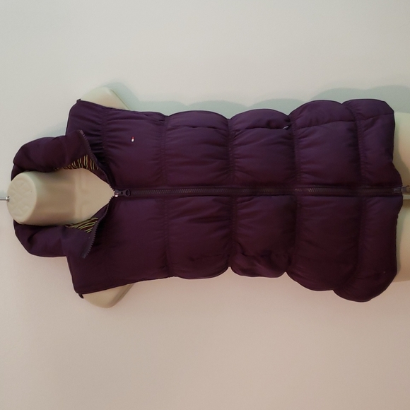 Tommy Hilfiger puffer vest in a size M. It is a deep purple in color. EUC